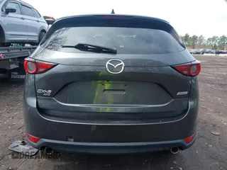 2018 Mazda CX-5 Grand Touring with VIN JM3KFBDM6J0388540, listed as a IAAI auction lot 41963726 with 103,148 mi miles. Bid and sale history available at carsss.com. Image 16.