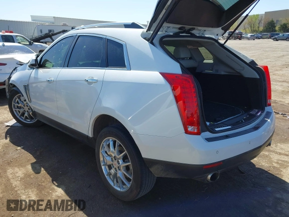 2014 Cadillac SRX Performance Collection with VIN 3GYFNCE38ES675508, listed as a IAAI auction lot 41969292 with 147,534 mi miles and . Bid and sale history available at DreamBid. Image 3.