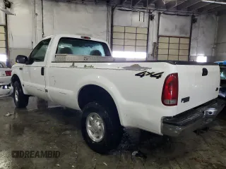 2001 Ford Super Duty F-250 XL with VIN 1FTNF21L21ED24936, listed as a Copart auction lot 79459704 with 69,304 mi miles and Clean Title. Bid and sale history available at carsss.com. Image 2.