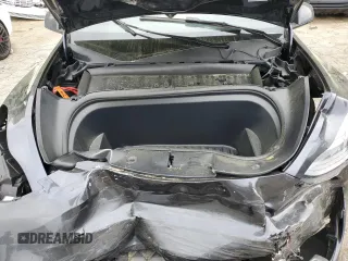 2024 Tesla Model Y Long Range z VIN 7SAYGDEE9RA293776, wystawiony jako Copart lot #51289225 z przebiegiem 12 990 mil mil oraz Szkoda całkowita • Salvage title. Historia ofert i sprzedaży dostępna na DreamBid. Obrazek 11.
