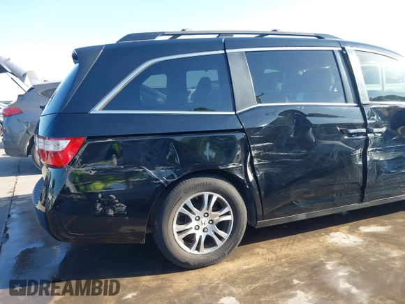 2013 Honda Odyssey EX-L with VIN 5FNRL5H6XDB090768, listed as a IAAI auction lot 42008759 with 116,052 mi miles and . Bid and sale history available at carsss.com. Image 18.