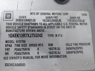 1999 GMC Yukon with VIN 1GKEK13R7XJ753243, listed as a IAAI auction lot 41231957 with 207,092 mi miles. Bid and sale history available at carsss.com. Image 9.