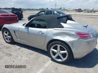 2008 Saturn Sky z VIN 1G8MC35BX8Y128872, wystawiony jako IAAI lot #42152153 z przebiegiem 62 022 mil mil oraz . Historia ofert i sprzedaży dostępna na DreamBid. Obrazek 3.