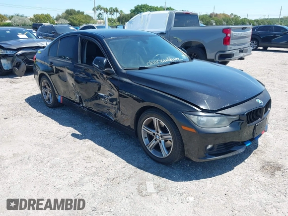 2015 BMW 3 Series 328i with VIN WBA3C1C58FK123489, listed as a IAAI auction lot 42026400 with 127,880 mi miles and . Bid and sale history available at carsss.com. Image 1.