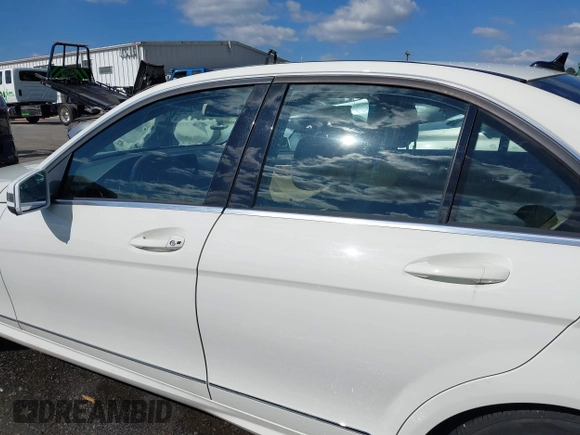 2012 Mercedes-Benz C C 300 Sport with VIN WDDGF8BB9CR230328, listed as a IAAI auction lot 42024792 with 129,739 mi miles. Bid and sale history available at carsss.com. Image 14.