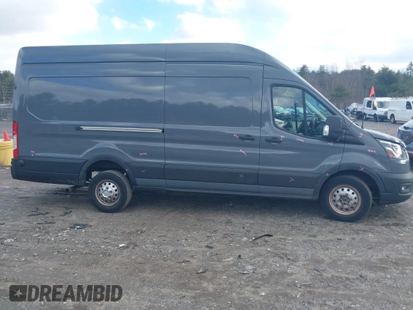 2023 Ford Transit Cargo with VIN 1FTBR3U88PKB86644, listed as a IAAI auction lot 41089106 with 8,095 mi miles and . Bid and sale history available at DreamBid. Image 13.