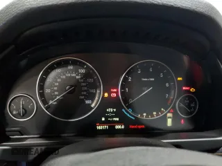 2014 BMW X5 xDrive35i z VIN 5UXKR0C5XE0K43083, wystawiony jako Copart lot #59182445 z przebiegiem 163 171 mil mil oraz Szkoda całkowita • Salvage title. Historia ofert i sprzedaży dostępna na DreamBid. Obrazek 9.