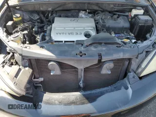 2005 Lexus RX 330 with VIN 2T2GA31U65C036959, listed as a Copart auction lot 64513135 with 128,900 mi miles and Salvage title. Bid and sale history available at DreamBid. Image 12.
