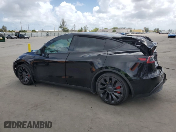 2023 Tesla Model Y Performance with VIN 7SAYGDEF8PF762915, listed as a Copart auction lot 50270285 with 23,893 mi miles and Salvage Title. Bid and sale history available at DreamBid. Image 2.