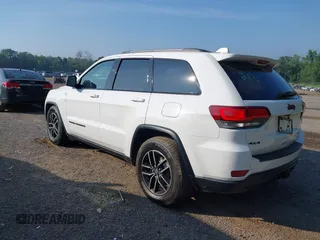 2017 Jeep Grand Cherokee Trailhawk with VIN 1C4RJFLG2HC670868, listed as a IAAI auction lot 42711041 with 129,465 mi miles and . Bid and sale history available at DreamBid. Image 3.