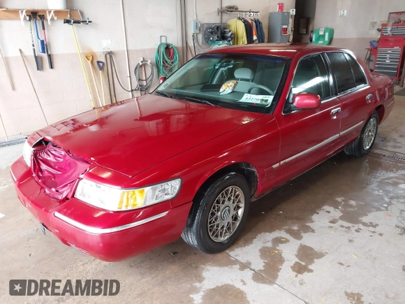 2001 Mercury Grand Marquis GS z VIN 2MEFM74W01X636957, wystawiony jako IAAI lot #42270858 z przebiegiem 181 372 mil mil oraz . Historia ofert i sprzedaży dostępna na DreamBid. Obrazek 2.
