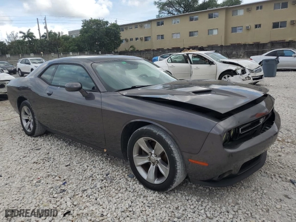 2015 Dodge Challenger SXT with VIN 2C3CDZAG4FH728088, listed as a Copart auction lot 52515645 with 128,104 mi miles and Salvage Title. Bid and sale history available at carsss.com. Image 4.