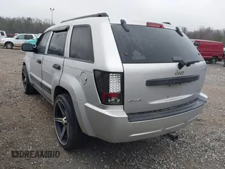 2005 Jeep Grand Cherokee Laredo z VIN 1J4GR48K05C506865, wystawiony jako IAAI lot #41539102 z przebiegiem 237 208 mil mil oraz . Historia ofert i sprzedaży dostępna na DreamBid. Obrazek 3.