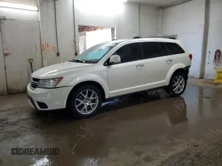 2014 Dodge Journey Limited with VIN 3C4PDCDG6ET122674, listed as a Copart auction lot 77405784 with 142,982 mi miles and Salvage Title. Bid and sale history available at DreamBid. Image 1.