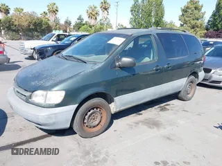 2000 Toyota Sienna LE with VIN 4T3ZF13CXYU312352, listed as a IAAI auction lot 42629403 with 166,361 mi miles and . Bid and sale history available at DreamBid. Image 2.