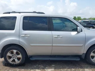 2015 Honda Pilot EX-L z VIN 5FNYF3H57FB022221, wystawiony jako IAAI lot #42101582 z przebiegiem 204 259 mil mil oraz . Historia ofert i sprzedaży dostępna na DreamBid. Obrazek 13.