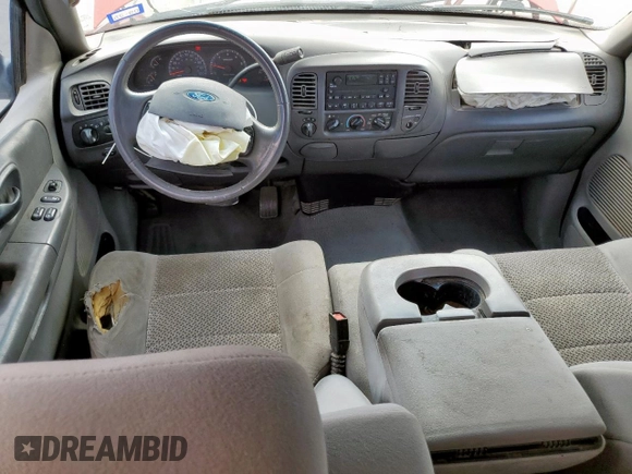 2003 Ford F-150 XL z VIN 1FTRX18L33NB73770, wystawiony jako Copart lot #59021845 z przebiegiem 344 989 mil mil oraz Szkoda całkowita • Salvage title. Historia ofert i sprzedaży dostępna na DreamBid. Obrazek 8.