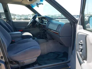 1996 Jeep Grand Cherokee with VIN 1J4EZ58S5TC149533, listed as a IAAI auction lot 42456529 with 173,872 mi miles and . Bid and sale history available at DreamBid. Image 5.