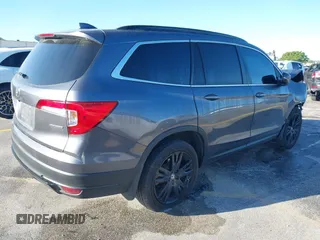 2022 Honda Pilot Special Edition with VIN 5FNYF5H25NB031399, listed as a IAAI auction lot 41638517 with 34,239 mi miles and . Bid and sale history available at carsss.com. Image 4.