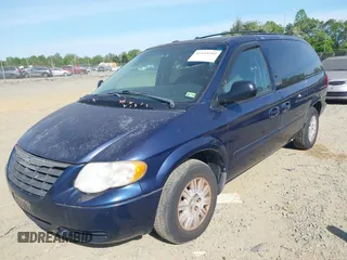 2005 Chrysler Town & Country LX with VIN 2C4GP44R45R232608, listed as a IAAI auction lot 42115292 with 145,502 mi miles. Bid and sale history available at carsss.com. Image 2.