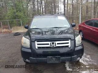 2006 Honda Pilot EX-L with VIN 5FNYF18776B021690, listed as a IAAI auction lot 42016219 with 239,666 mi miles and . Bid and sale history available at DreamBid. Image 12.