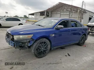 2014 Ford Taurus Limited z VIN 1FAHP2F86EG100650, wystawiony jako Copart lot #57033215 z przebiegiem 79 985 mil mil oraz Szkody całkowita. Historia ofert i sprzedaży dostępna na DreamBid. Obrazek 1.