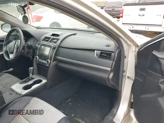 2012 Toyota Camry L with VIN 4T1BF1FK2CU037226, listed as a IAAI auction lot 42017056 with 218,932 mi miles and . Bid and sale history available at carsss.com. Image 5.