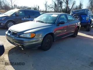 2004 Pontiac Grand Am SE with VIN 1G2NE52F54M560234, listed as a IAAI auction lot 41716361 with 256,571 mi miles. Bid and sale history available at carsss.com. Image 2.