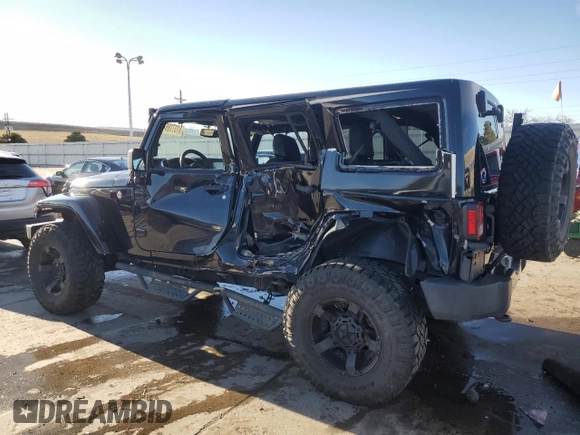 2016 Jeep Wrangler Unlimited 75th Anniversary with VIN 1C4BJWEG7GL113824, listed as a Copart auction lot 81372864 with 98,497 mi miles and Salvage title. Bid and sale history available at DreamBid. Image 2.