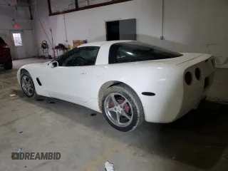 2002 Chevrolet Corvette with VIN 1G1YY22G325125574, listed as a Copart auction lot 87064914 with 0 mi miles and Salvage Title. Bid and sale history available at carsss.com. Image 2.