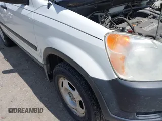 2003 Honda CR-V LX z VIN SHSRD78443U157640, wystawiony jako IAAI lot #42265529 z przebiegiem 154 407 mil mil oraz . Historia ofert i sprzedaży dostępna na DreamBid. Obrazek 14.