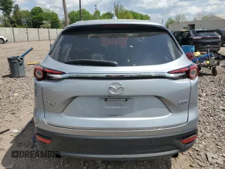 2016 Mazda CX-9 Touring z VIN JM3TCBCY0G0120898, wystawiony jako Copart lot #53628085 z przebiegiem 108 066 mil mil oraz Szkoda całkowita • Salvage title. Historia ofert i sprzedaży dostępna na DreamBid. Obrazek 6.