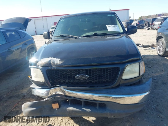 2003 Ford F-150 XL with VIN 1FTRF17223NA54202, listed as a IAAI auction lot 41535299 with Not Provided miles and . Bid and sale history available at DreamBid. Image 12.