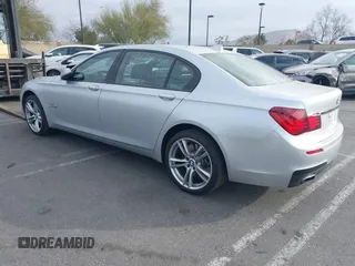 2015 BMW 7 Series 750Li with VIN WBAYE8C5XFD782039, listed as a IAAI auction lot 41505626 with 74,716 mi miles. Bid and sale history available at carsss.com. Image 3.