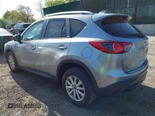 2014 Mazda CX-5 Touring with VIN JM3KE4CY0E0302583, listed as a IAAI auction lot 41947735 with 122,077 mi miles. Bid and sale history available at carsss.com. Image 3.