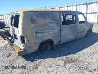 1998 Ford Econoline Cargo with VIN 1FTRE1423WHA86845, listed as a IAAI auction lot 41741274 with Not Provided miles. Bid and sale history available at carsss.com. Image 4.