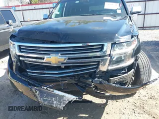 2019 Chevrolet Suburban LT with VIN 1GNSCJKC5KR360318, listed as a IAAI auction lot 41504344 with 82,997 mi miles and . Bid and sale history available at DreamBid. Image 12.