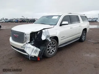 2015 GMC Yukon XL Denali with VIN 1GKS2JKJ2FR590502, listed as a IAAI auction lot 41758575 with 129,777 mi miles. Bid and sale history available at carsss.com. Image 2.