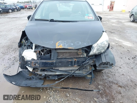 2012 Toyota Yaris L with VIN JTDKTUD30CD539341, listed as a IAAI auction lot 41981342 with 210,253 mi miles. Bid and sale history available at carsss.com. Image 6.