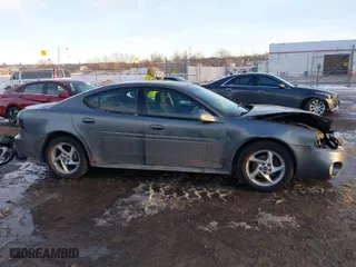 2004 Pontiac Grand Prix GTP with VIN 2G2WR524041363510, listed as a IAAI auction lot 41334336 with 187,802 mi miles. Bid and sale history available at carsss.com. Image 13.