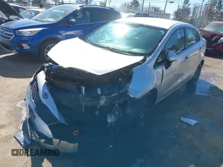 2014 Kia Rio LX with VIN KNADM4A35E6395218, listed as a IAAI auction lot 41614054 with 134,535 mi miles and . Bid and sale history available at DreamBid. Image 17.