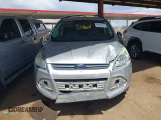 2013 Ford Escape SE with VIN 1FMCU0GX9DUB83512, listed as a IAAI auction lot 41970256 with 69,897 mi miles and . Bid and sale history available at DreamBid. Image 6.