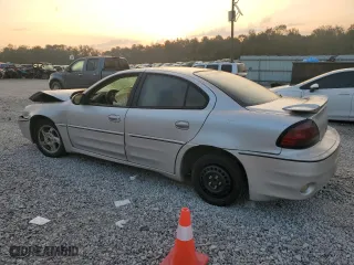 2004 Pontiac Grand Am GT1 with VIN 1G2NV52E14M667692, listed as a Copart auction lot 73339504 with 156,066 mi miles and Salvage Title. Bid and sale history available at carsss.com. Image 2.