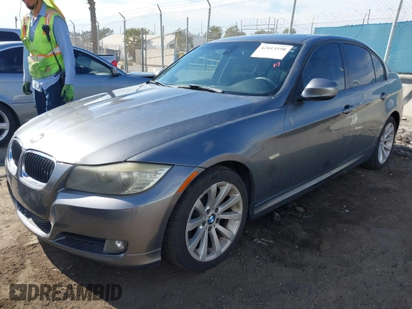 2011 BMW 3 Series 328i with VIN WBAPH5G55BNM71702, listed as a IAAI auction lot 42013598 with 192,744 mi miles. Bid and sale history available at carsss.com. Image 2.