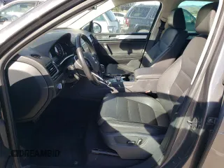 2016 Volkswagen Touareg Sport с VIN WVGEF9BP0GD012604, выставлен на аукционе Copart как лот 85132214 с пробегом 127 155 миль миль и Чистый • Clean title. История ставок и продаж доступна на DreamBid. Изображение 7.