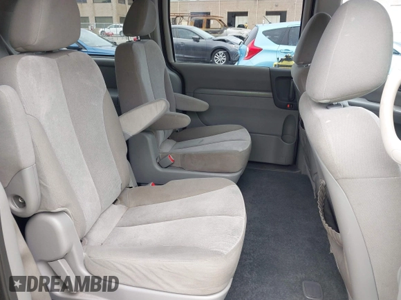 2012 Kia Sedona LX with VIN KNDMG4C78C6502141, listed as a IAAI auction lot 41725800 with 153,789 mi miles and . Bid and sale history available at carsss.com. Image 8.