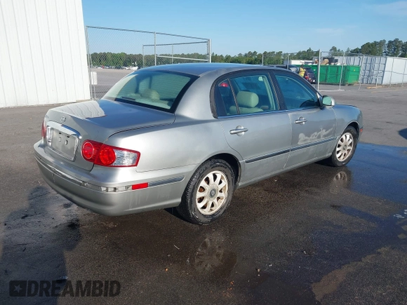 2004 Kia Amanti z VIN KNALD124645031511, wystawiony jako IAAI lot #42036901 z przebiegiem 218 926 mil mil oraz . Historia ofert i sprzedaży dostępna na DreamBid. Obrazek 4.