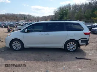 2016 Toyota Sienna XLE with VIN 5TDYK3DC5GS700459, listed as a IAAI auction lot 41905607 with Not provided miles and . Bid and sale history available at DreamBid. Image 14.