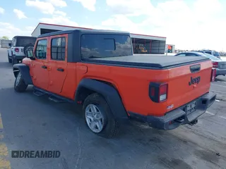 2020 Jeep Gladiator Sport S с VIN 1C6HJTAG1LL154854, выставлен на аукционе IAAI как лот 42272169 с пробегом 66 909 миль миль и . История ставок и продаж доступна на DreamBid. Изображение 3.