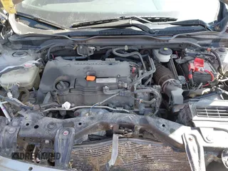 2021 Honda Civic Sport with VIN 2HGFC2F83MH540939, listed as a IAAI auction lot 41789508 with 100,274 mi miles and . Bid and sale history available at DreamBid. Image 10.